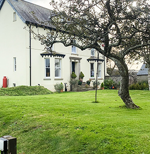 The front of the building, with the garden visible